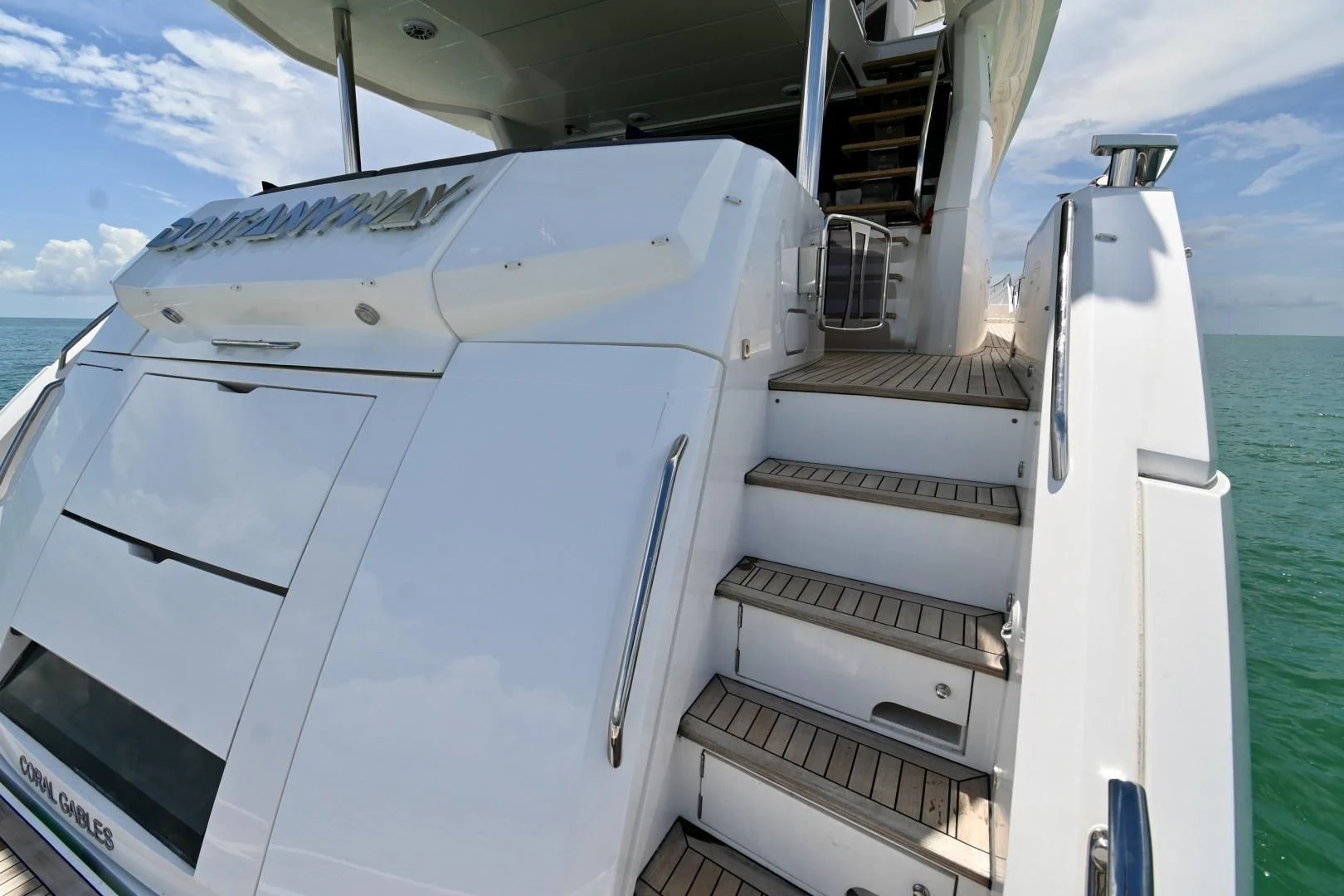 a white boat on a trailer aboard DO IT ANYWAY Yacht for Sale