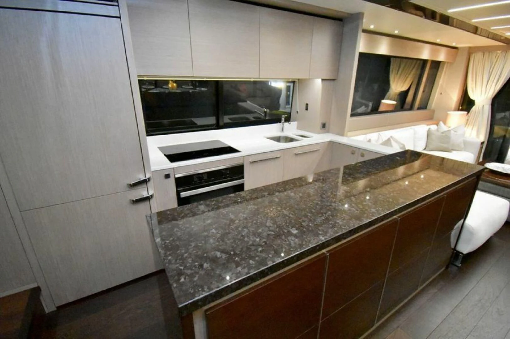 a kitchen with a marble counter top aboard DO IT ANYWAY Yacht for Sale