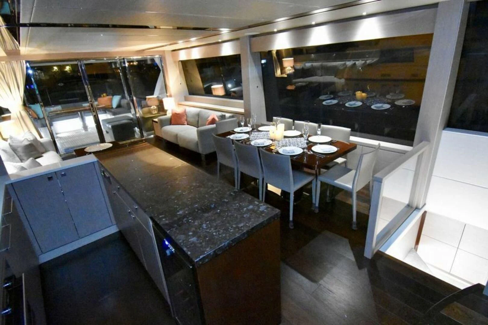 a room with tables and chairs aboard DO IT ANYWAY Yacht for Sale