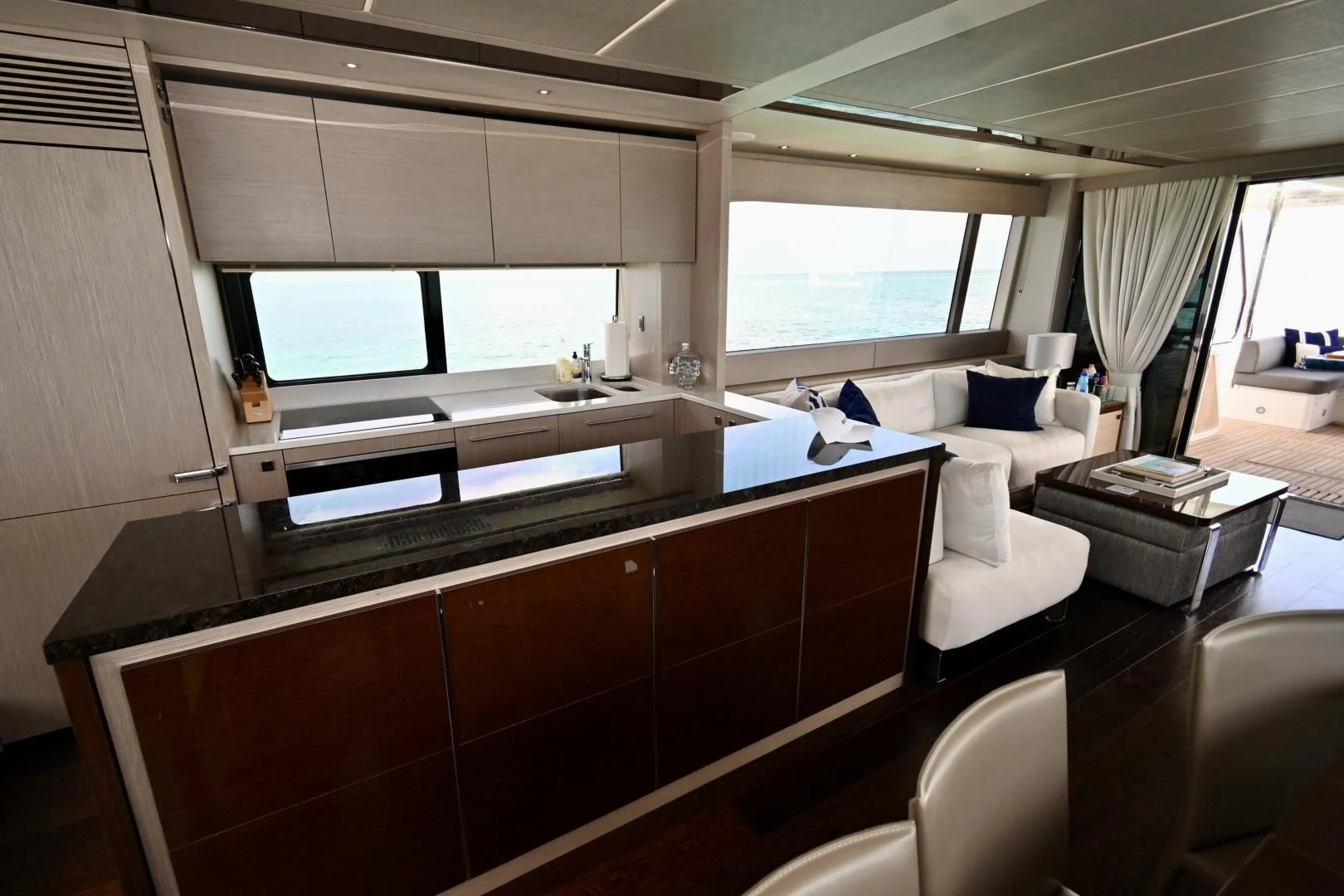 a room with a bed and desk aboard DO IT ANYWAY Yacht for Sale