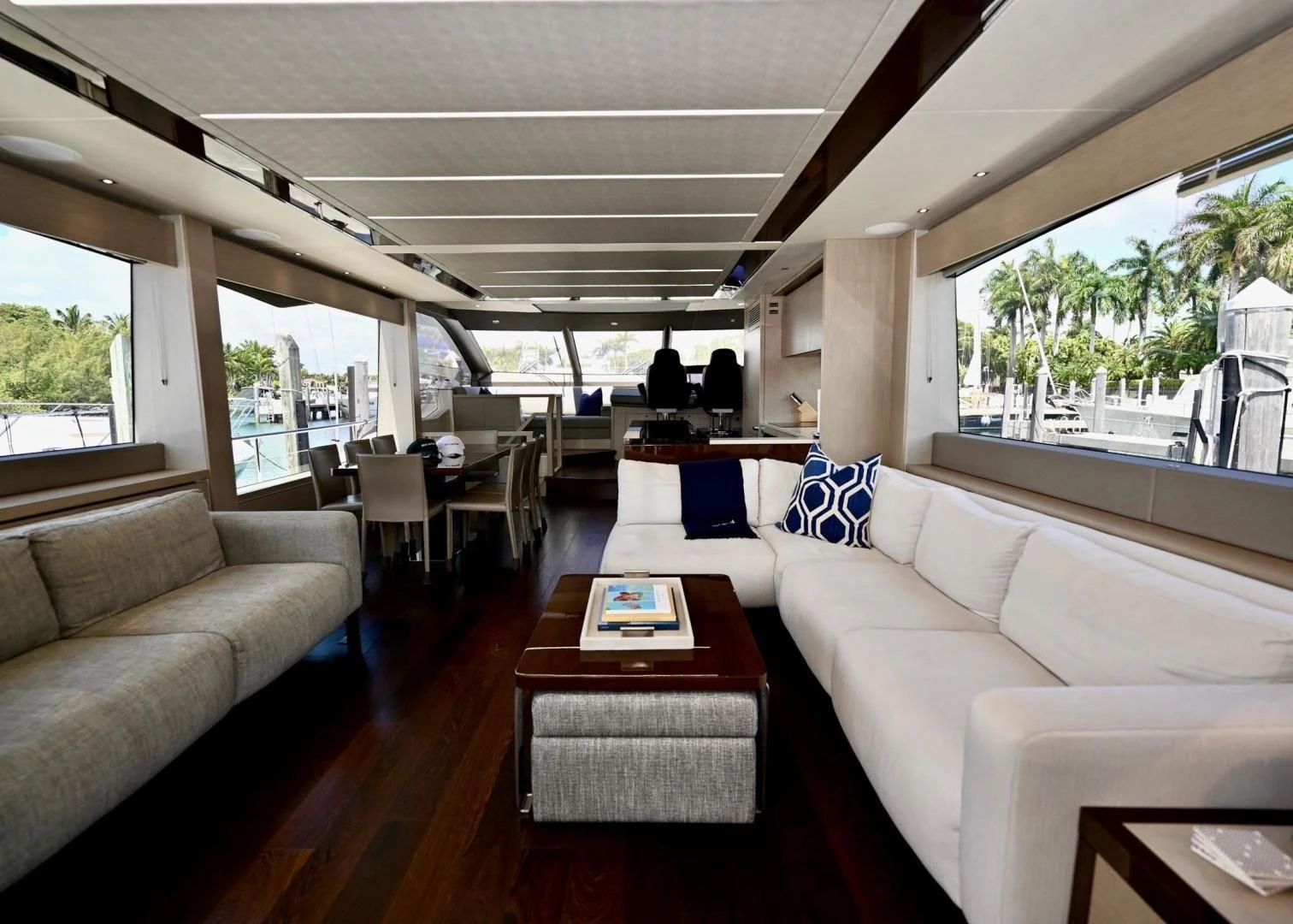 a living room with a couch and a table aboard DO IT ANYWAY Yacht for Sale