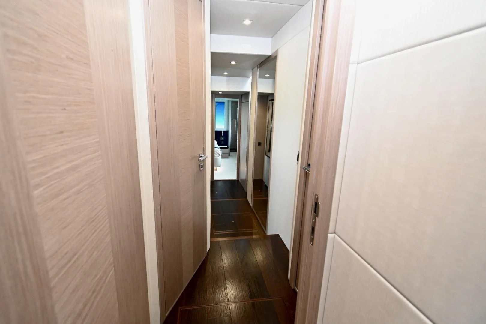 a hallway with doors aboard DO IT ANYWAY Yacht for Sale