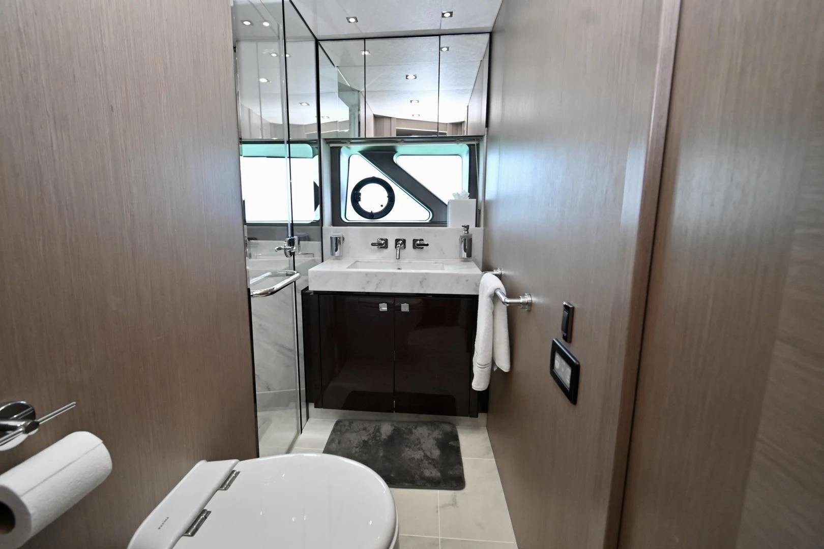 a bathroom with a sink and a shower aboard DO IT ANYWAY Yacht for Sale