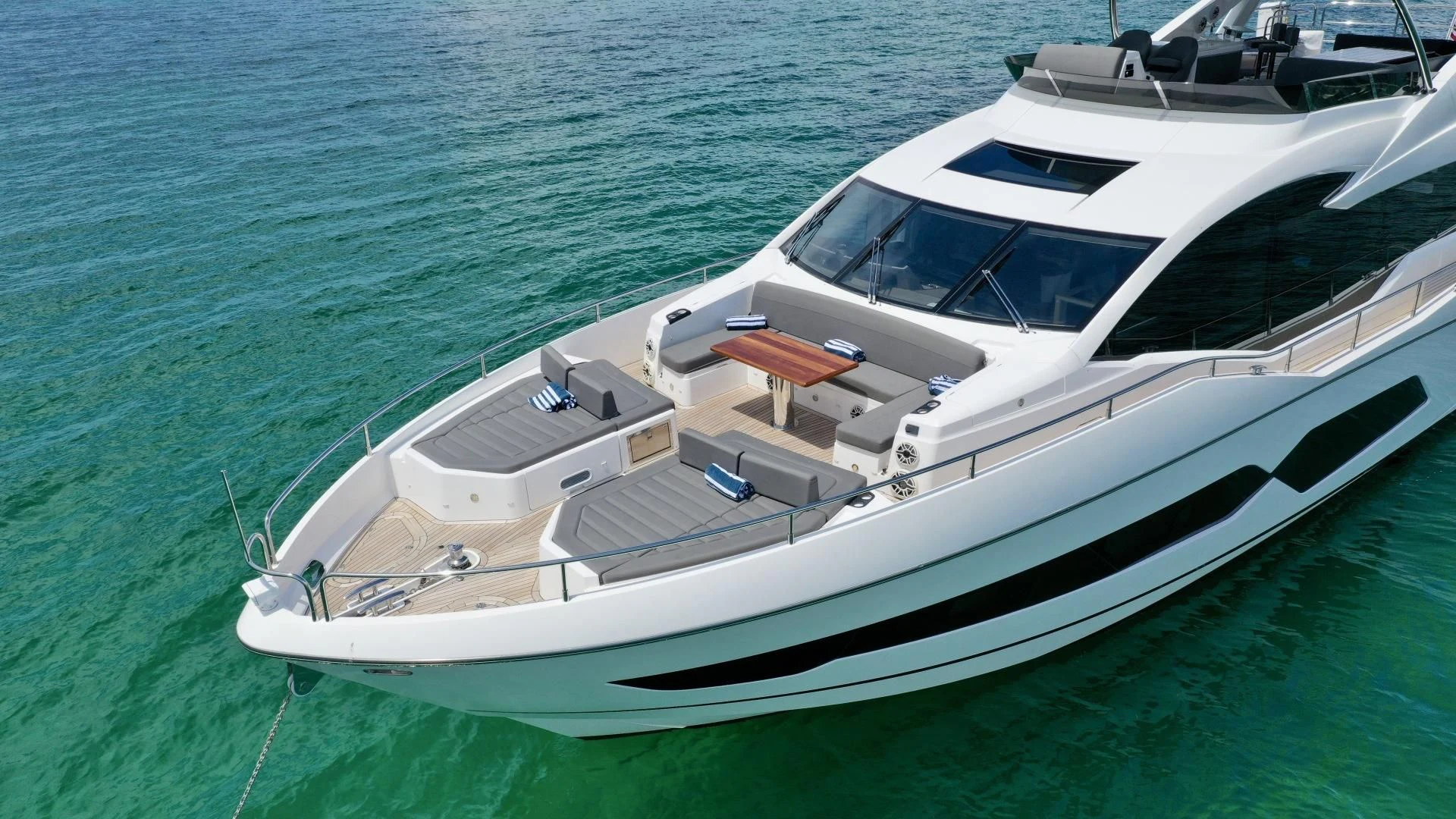a white boat in the water aboard DO IT ANYWAY Yacht for Sale