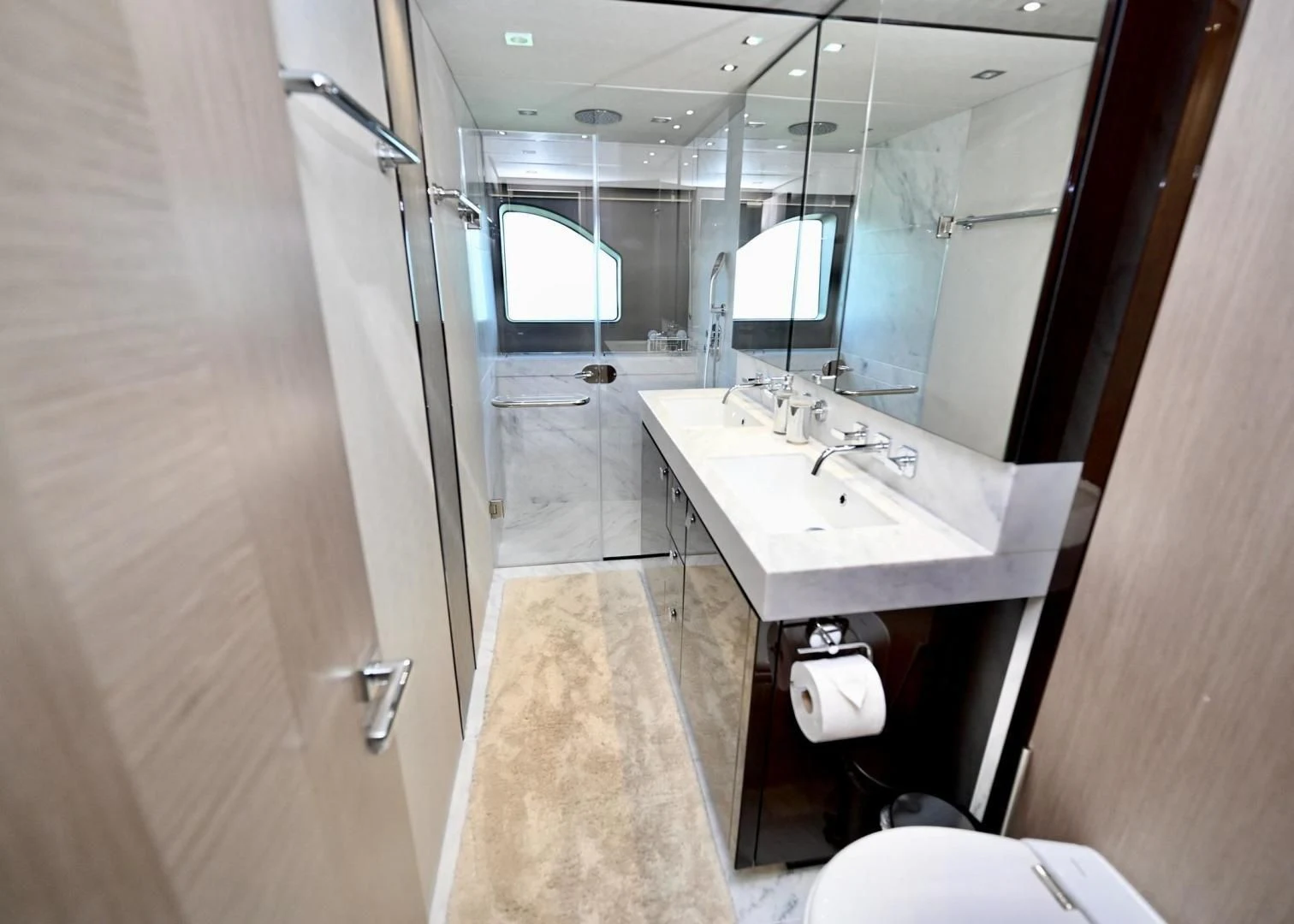 a bathroom with a sink and a mirror aboard DO IT ANYWAY Yacht for Sale