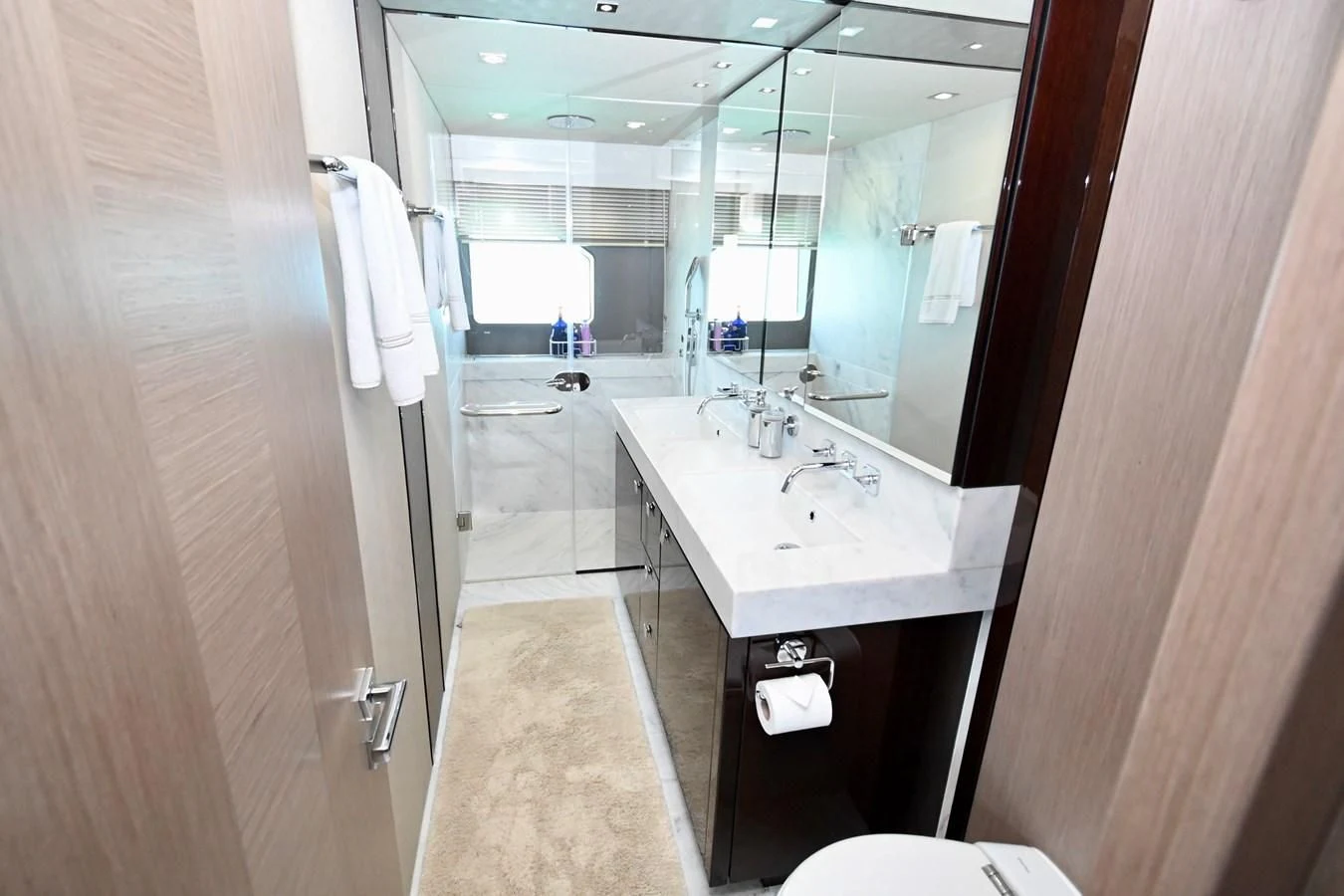 a bathroom with a sink and a mirror aboard DO IT ANYWAY Yacht for Sale
