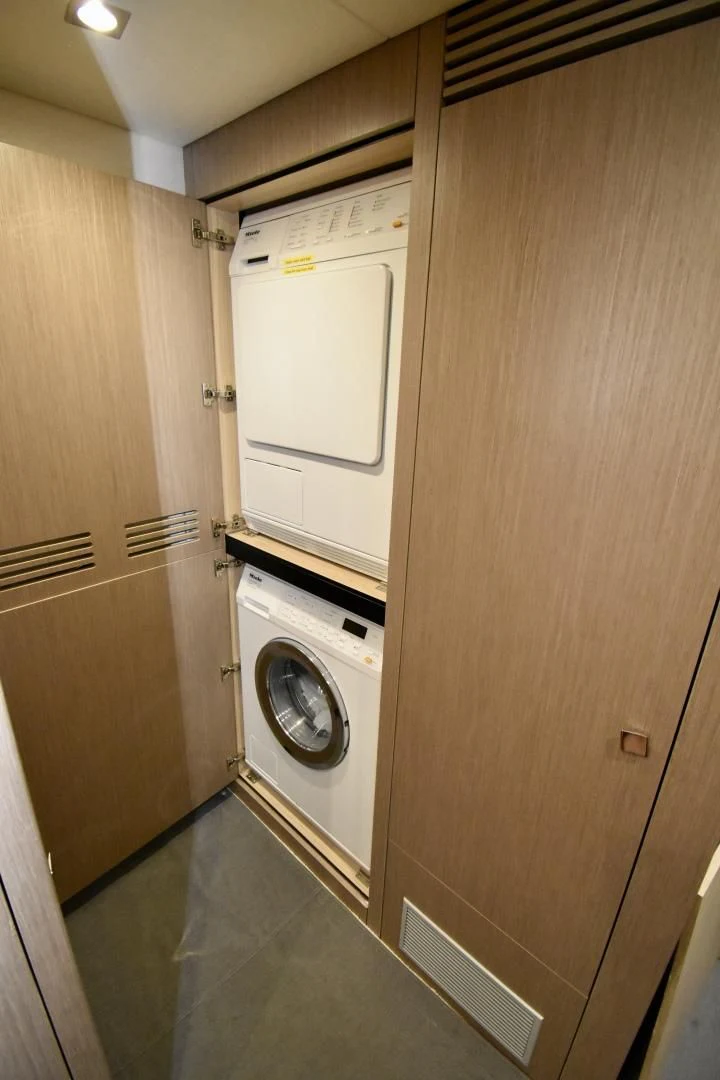 a washer and dryer in a room aboard DO IT ANYWAY Yacht for Sale