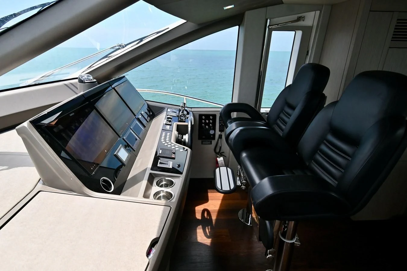 a room with a desk and chairs aboard DO IT ANYWAY Yacht for Sale