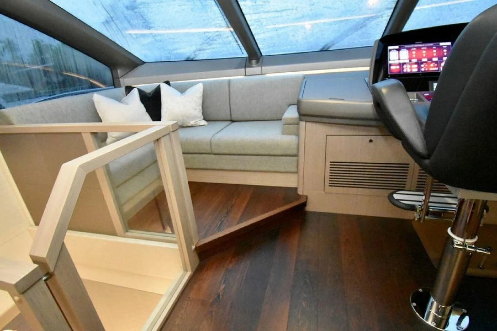 a room with a couch and a television aboard DO IT ANYWAY Yacht for Sale