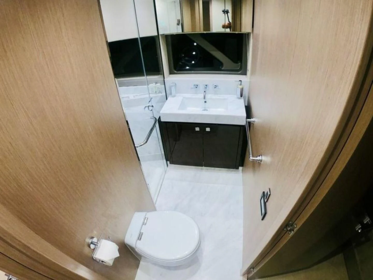 a bathroom with a sink and a toilet aboard DO IT ANYWAY Yacht for Sale