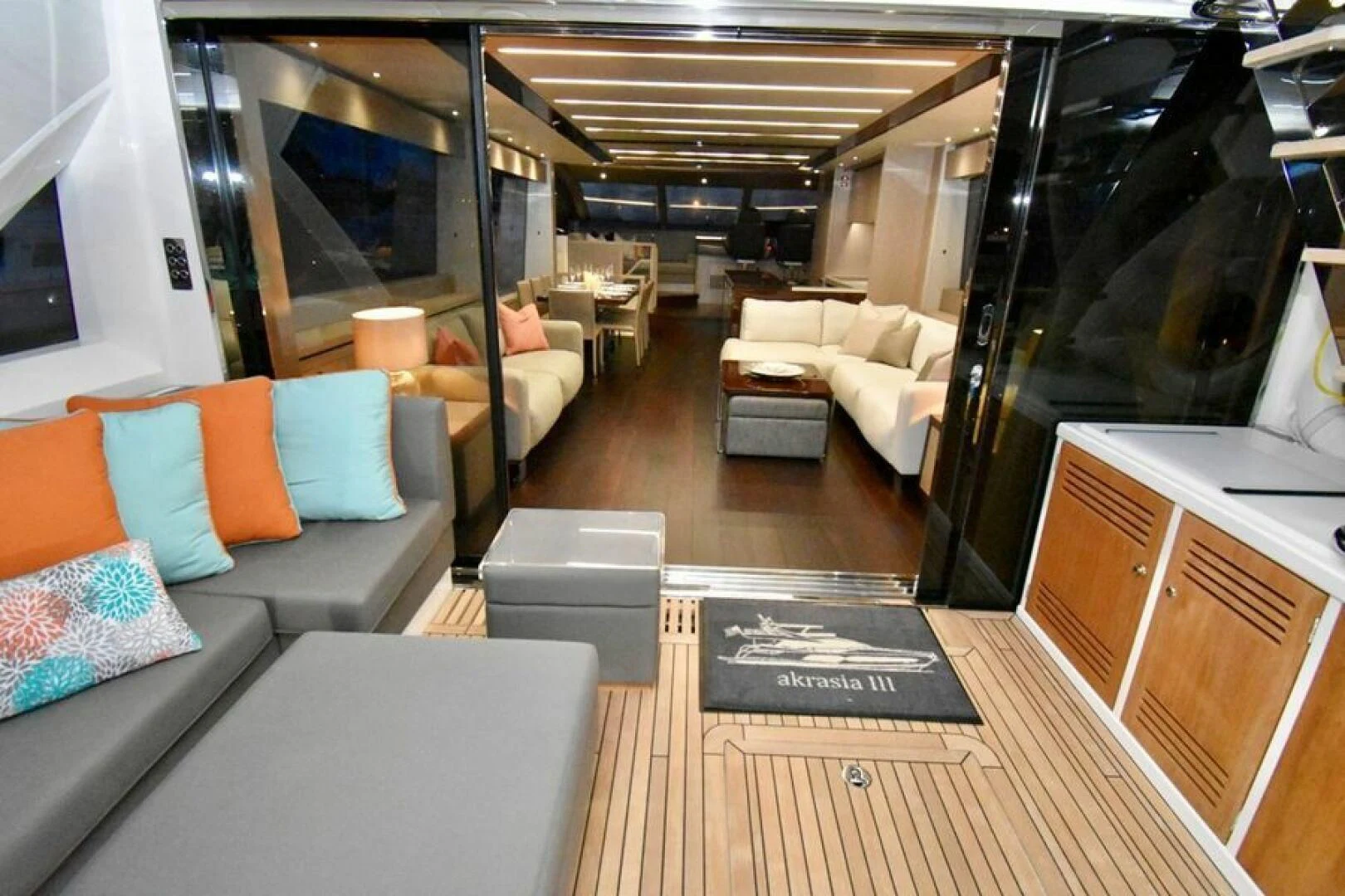 a living room with a couch and a table aboard DO IT ANYWAY Yacht for Sale