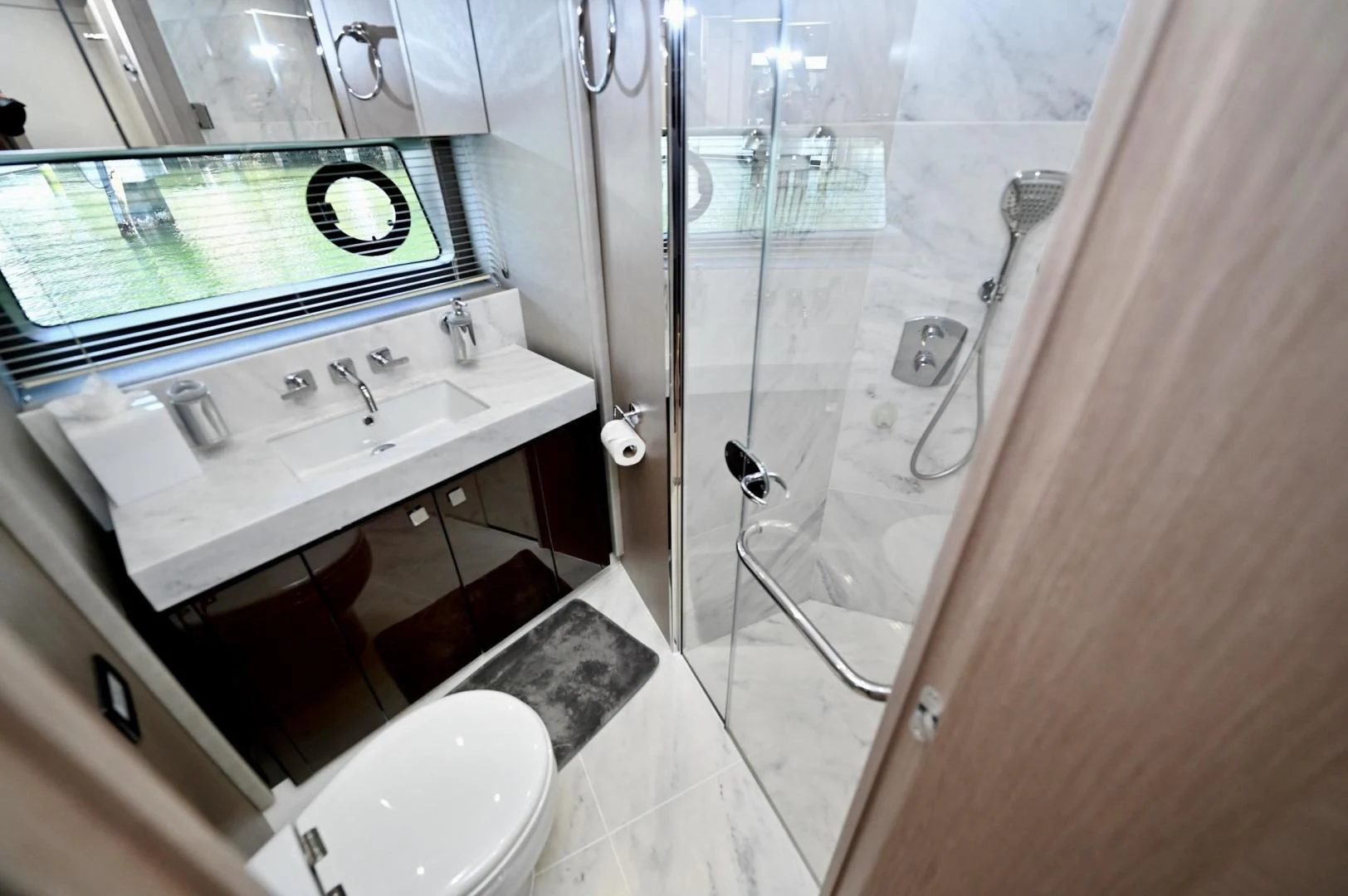 a bathroom with a sink and a shower aboard DO IT ANYWAY Yacht for Sale