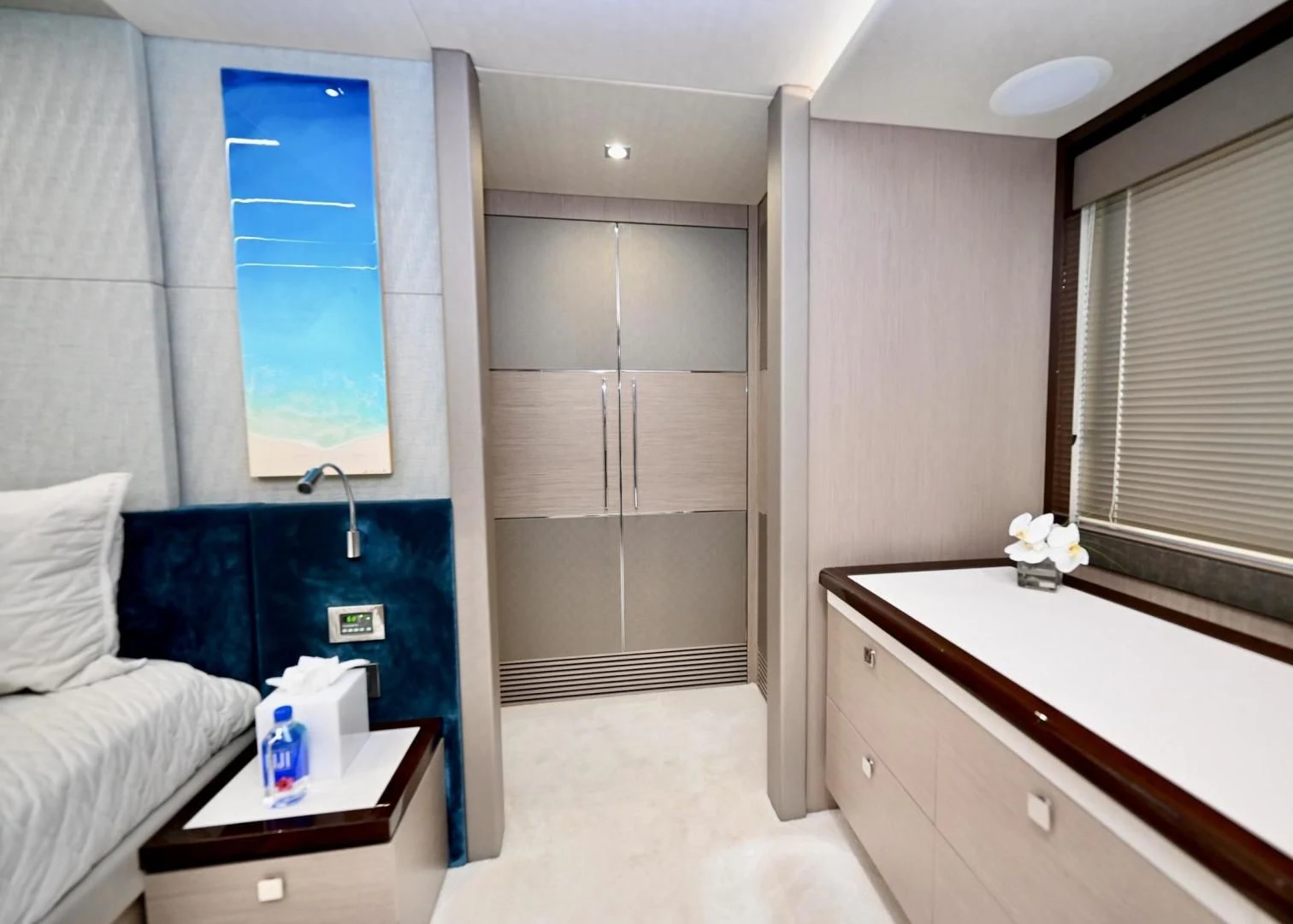 a room with a bed and a window aboard DO IT ANYWAY Yacht for Sale