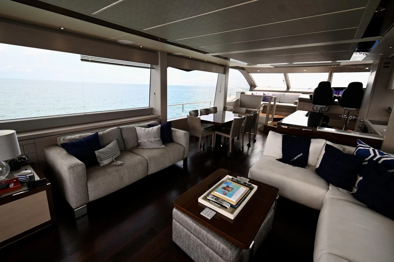 a living room with a couch and a table aboard DO IT ANYWAY Yacht for Sale