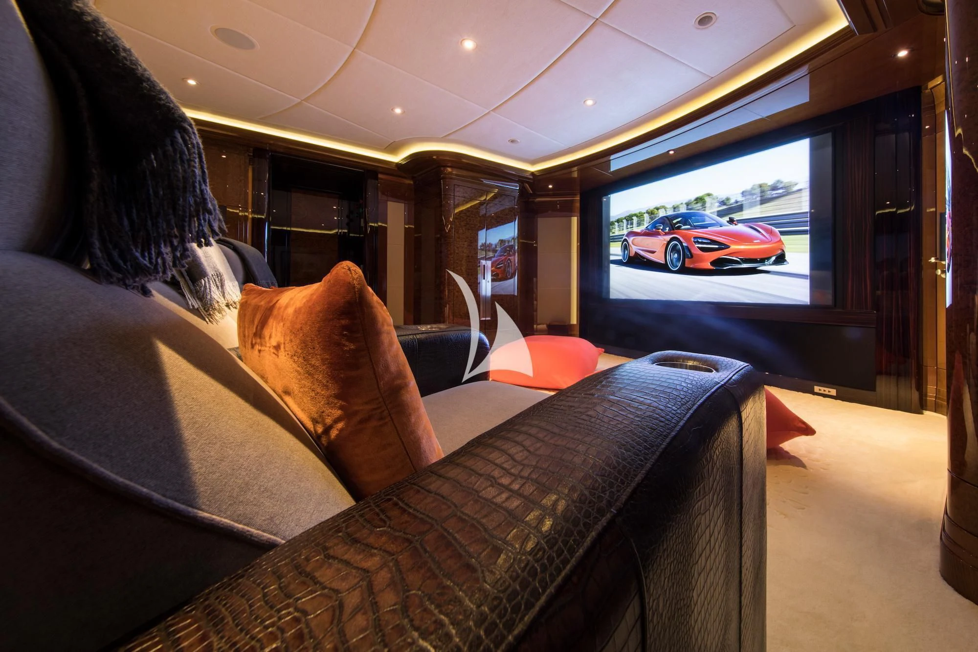 a person sitting on a couch looking out a window aboard ARIENCE Yacht for Sale