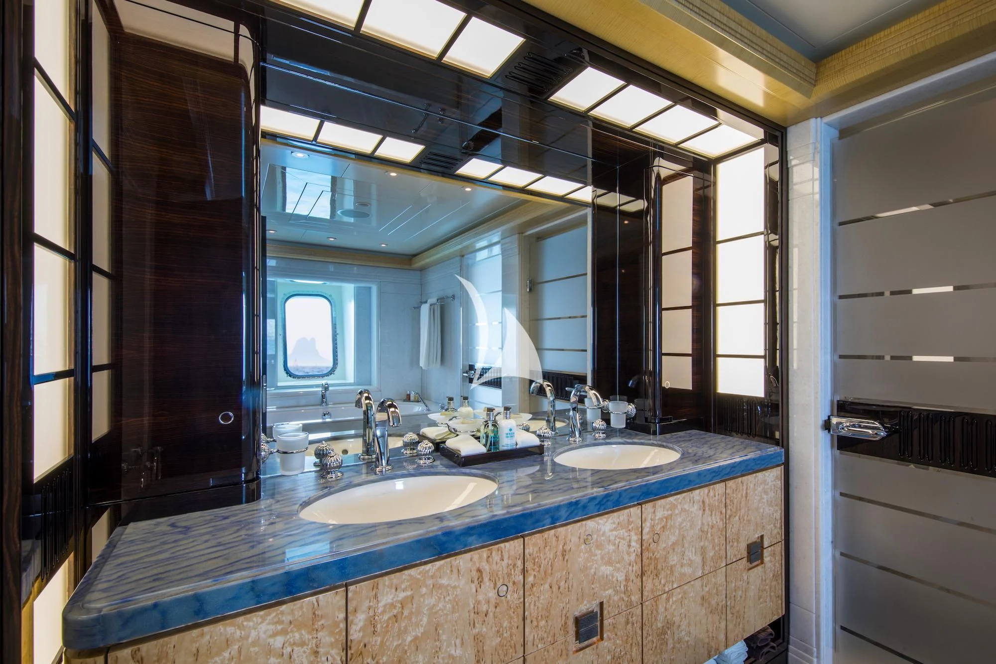 a bathroom with sinks and mirrors aboard ARIENCE Yacht for Sale