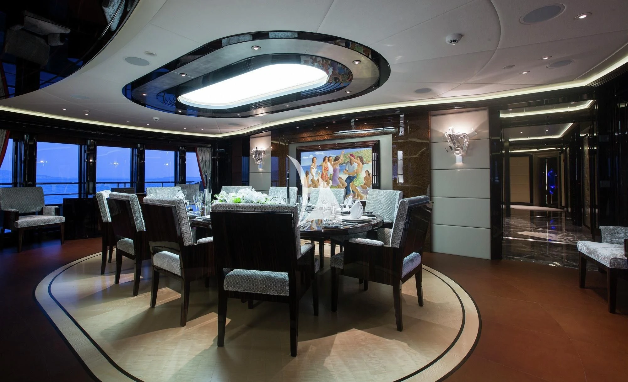 a room with tables and chairs aboard ARIENCE Yacht for Sale