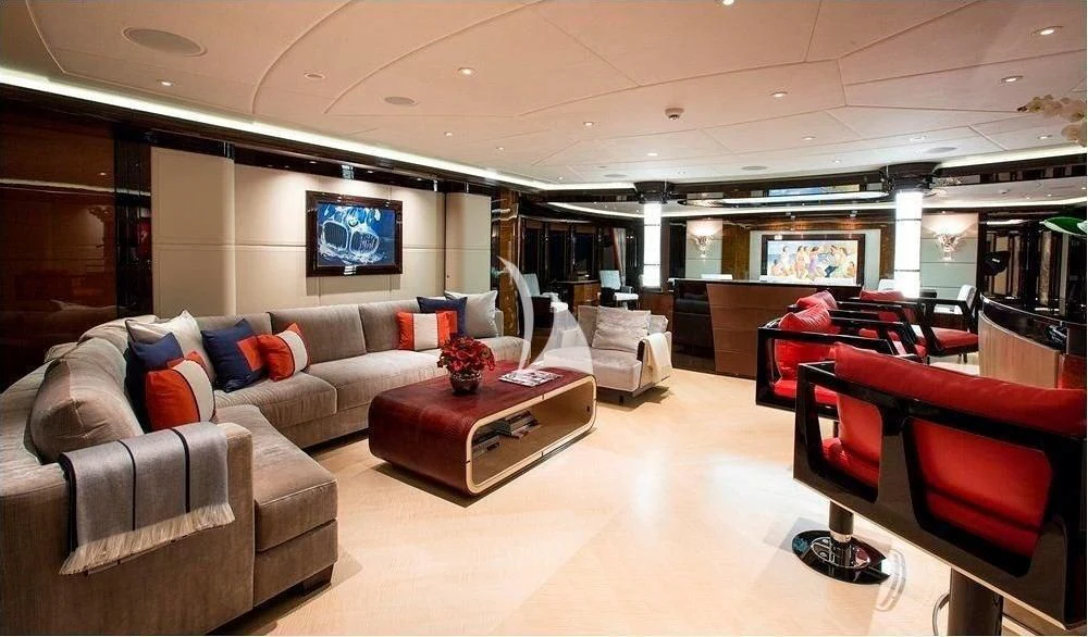 a living room with a couch and a tv aboard ARIENCE Yacht for Sale