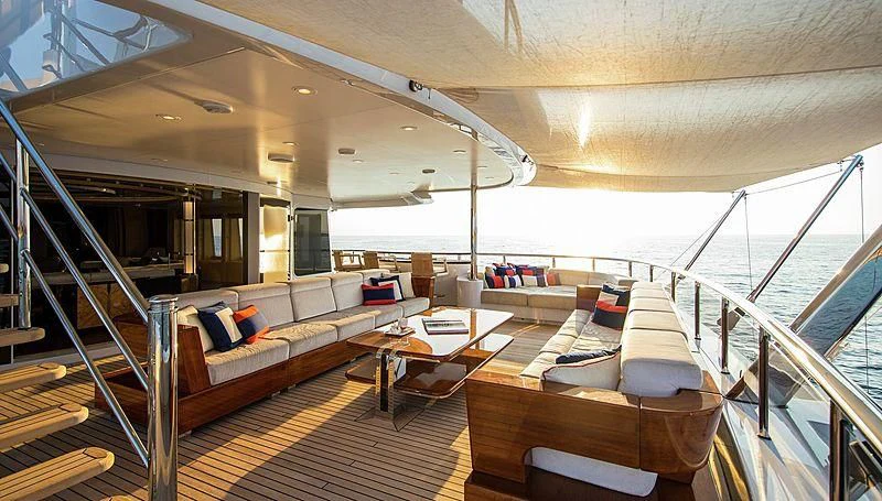 a large living room with a large balcony aboard ARIENCE Yacht for Sale