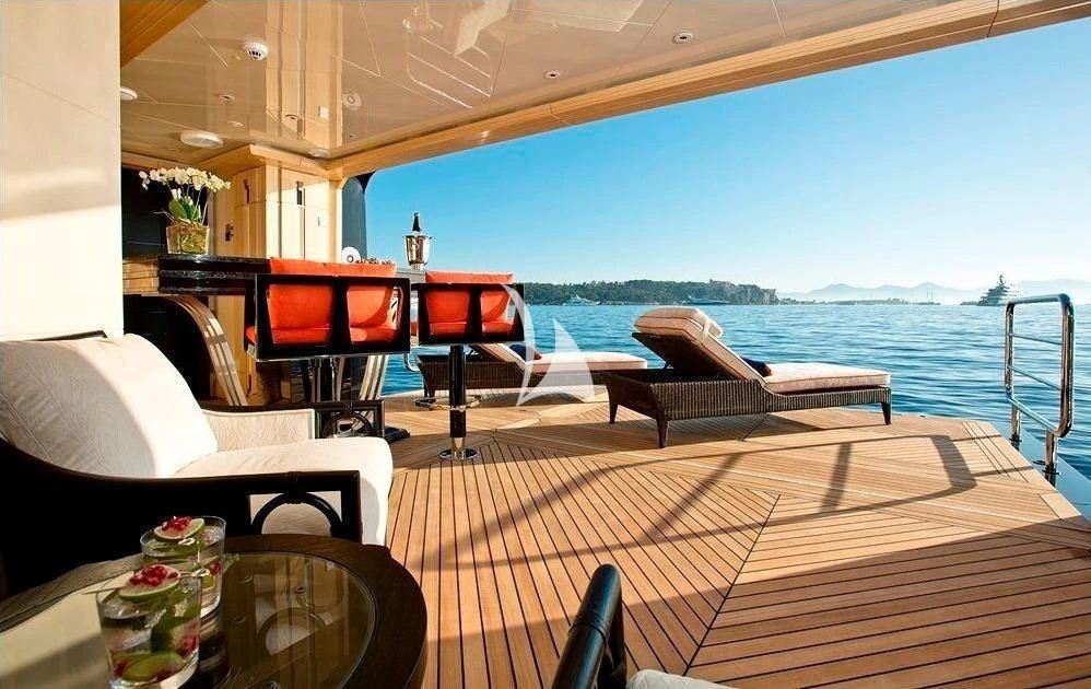 a room with a view of the ocean and a deck aboard ARIENCE Yacht for Sale
