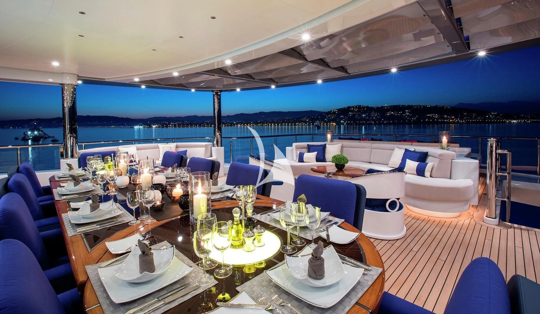 a large room with tables and chairs aboard ARIENCE Yacht for Sale