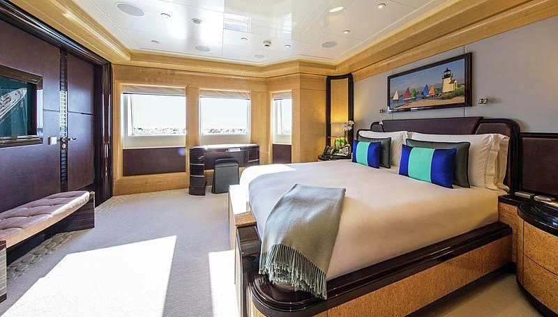 a large bedroom with a bed aboard ARIENCE Yacht for Sale