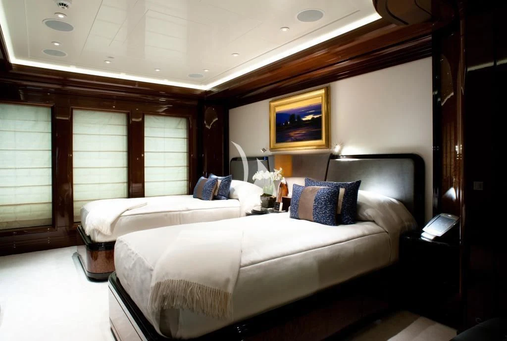 a room with two beds aboard ARIENCE Yacht for Sale