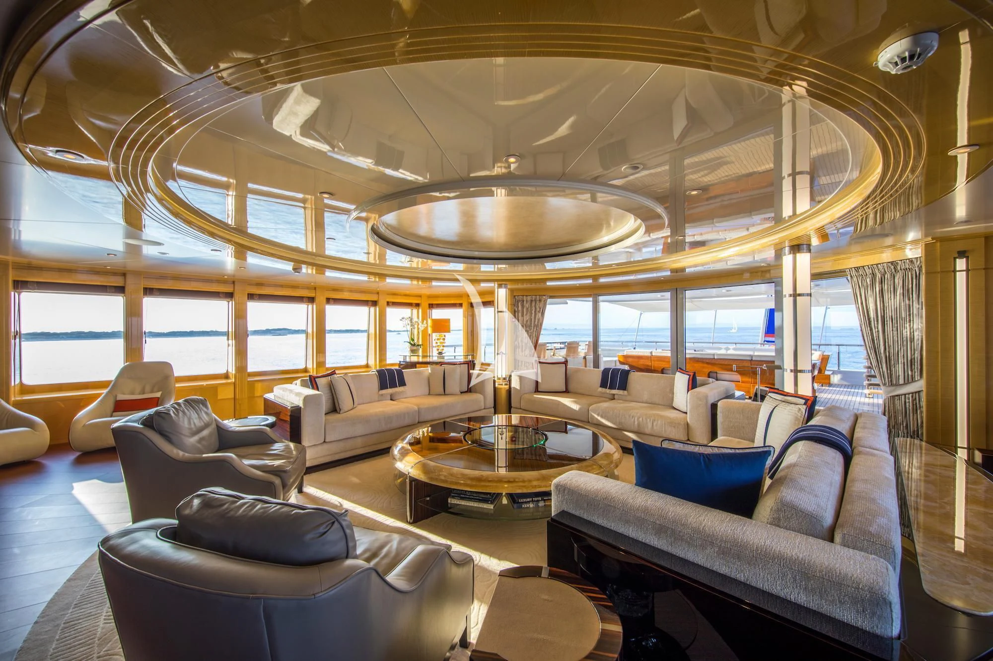 a large living room with a large glass ceiling aboard ARIENCE Yacht for Sale