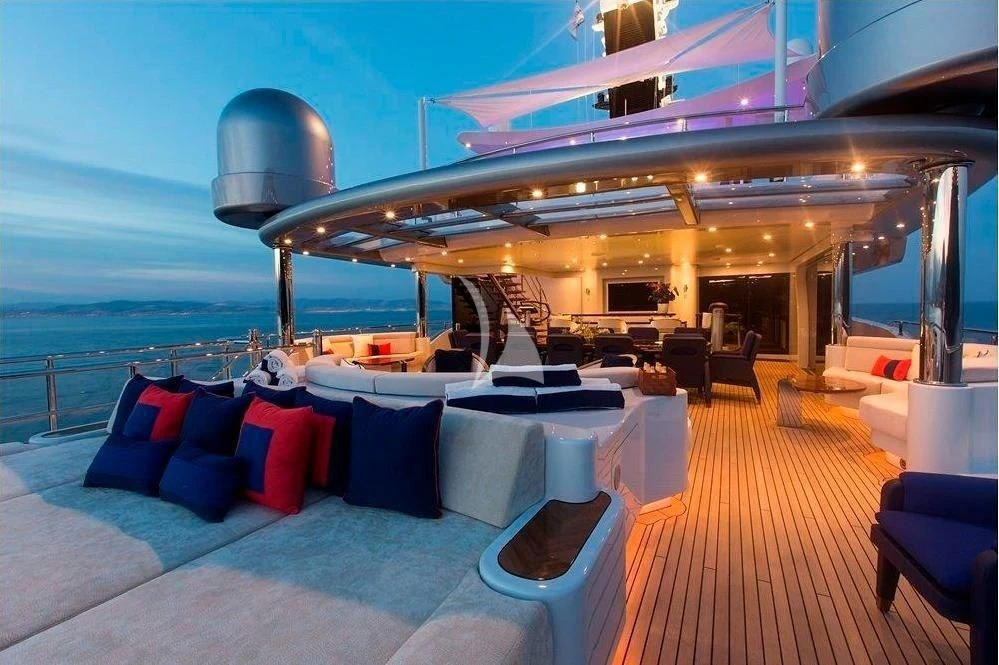 a cruise ship with a large cruise ship in the background aboard ARIENCE Yacht for Sale