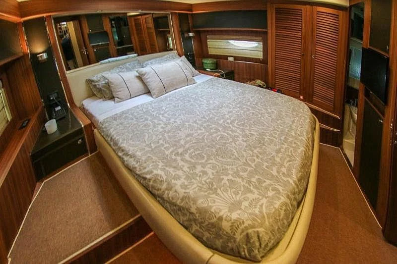 a bed in a room aboard SPYRO Yacht for Sale