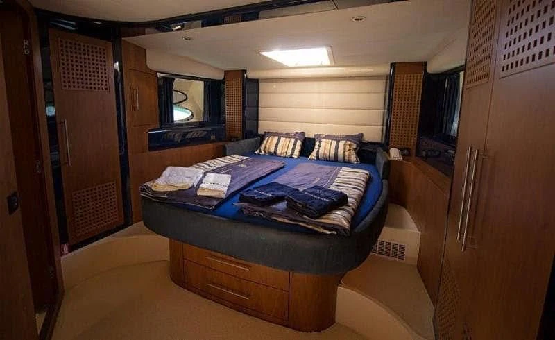 a bed in a room aboard SPYRO Yacht for Sale