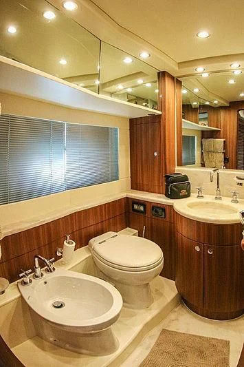 a bathroom with a sink and a toilet aboard SPYRO Yacht for Sale