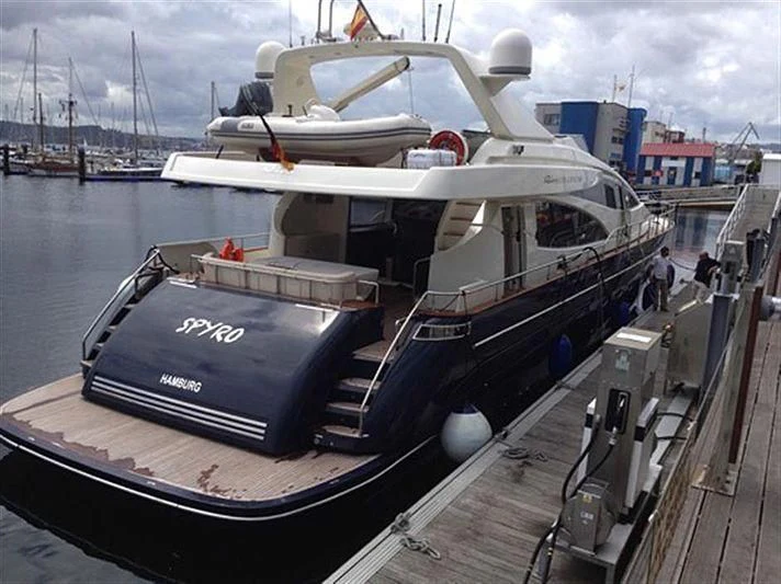 a boat on a dock aboard SPYRO Yacht for Sale