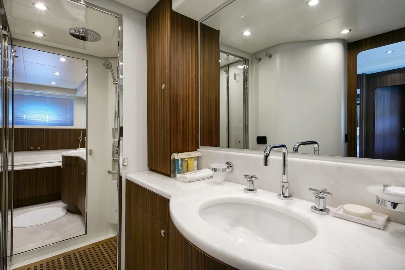 a bathroom with a sink and a mirror aboard BLACK PEARL Yacht for Sale