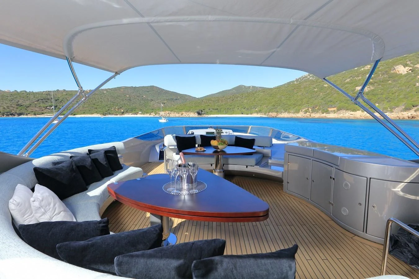 a table and chairs on a boat aboard BLACK PEARL Yacht for Sale