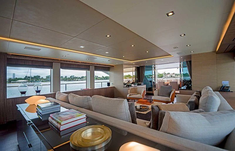 a living room with a large window aboard QUEEN D Yacht for Sale