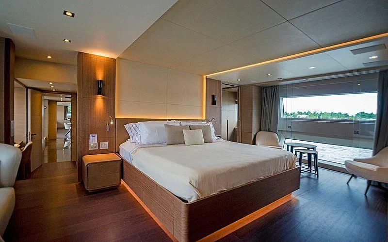 a large bed in a room aboard QUEEN D Yacht for Sale