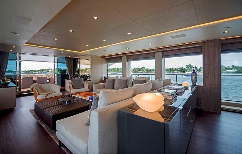 a living room with a large window aboard QUEEN D Yacht for Sale