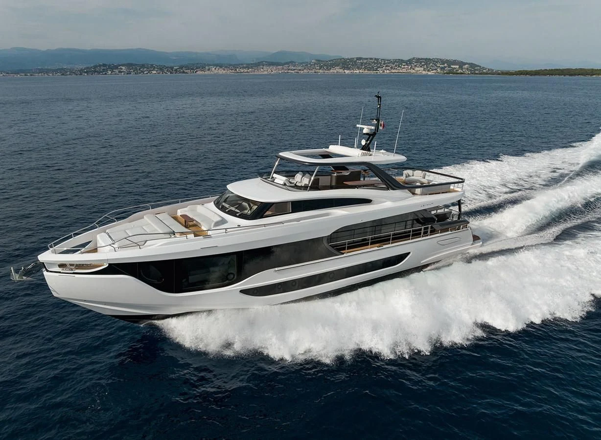 a white yacht on the water aboard AZIMUT GRANDE 26/25 Yacht for Sale