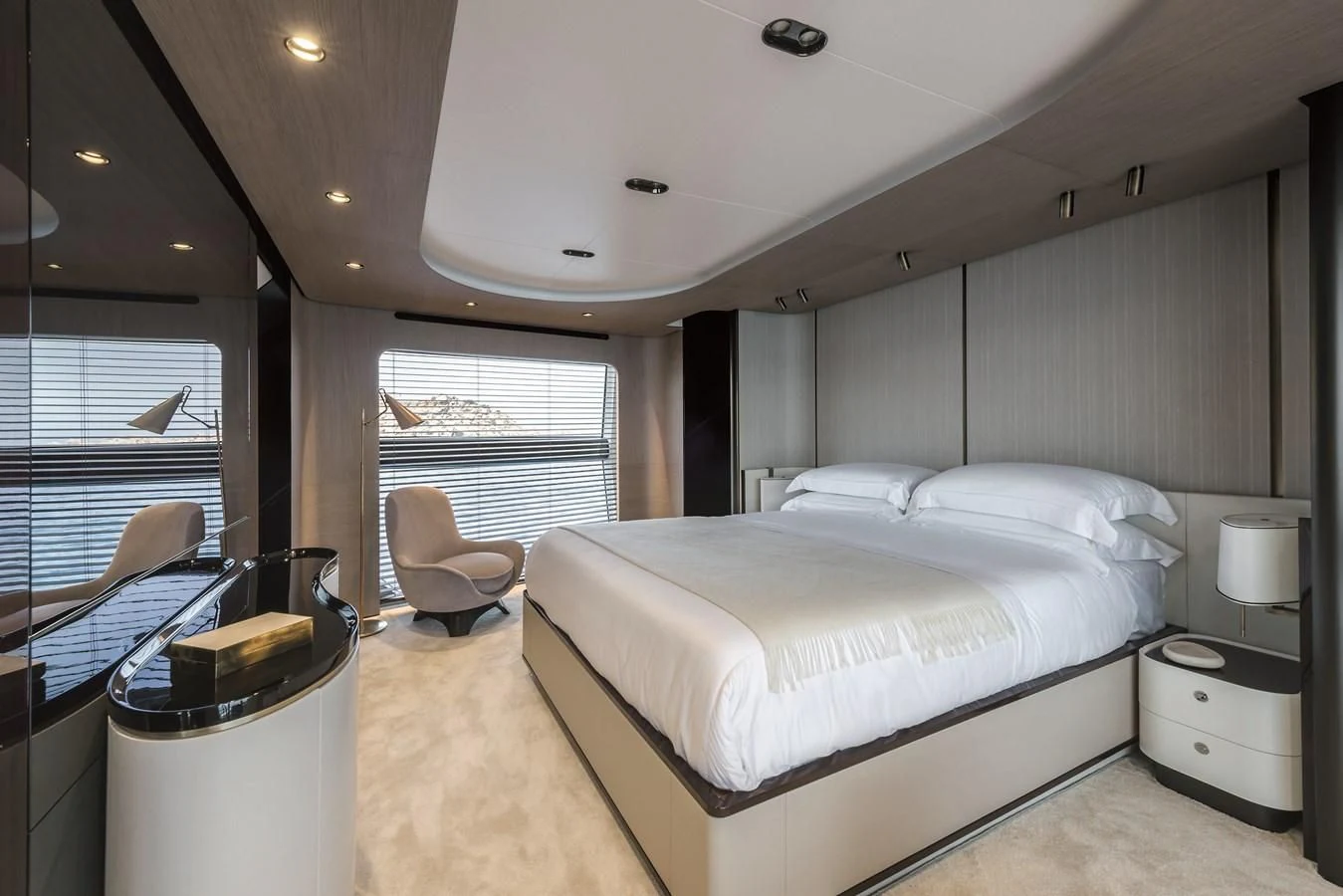 a bedroom with a large bed aboard AZIMUT GRANDE 26/25 Yacht for Sale