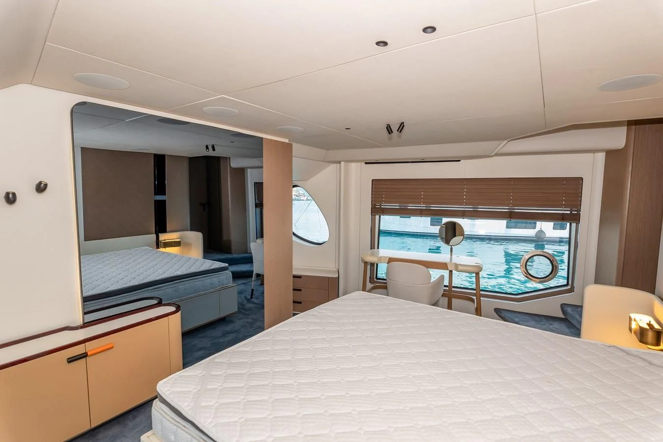 a bedroom with a large bed aboard AZIMUT GRANDE 26/25 Yacht for Sale