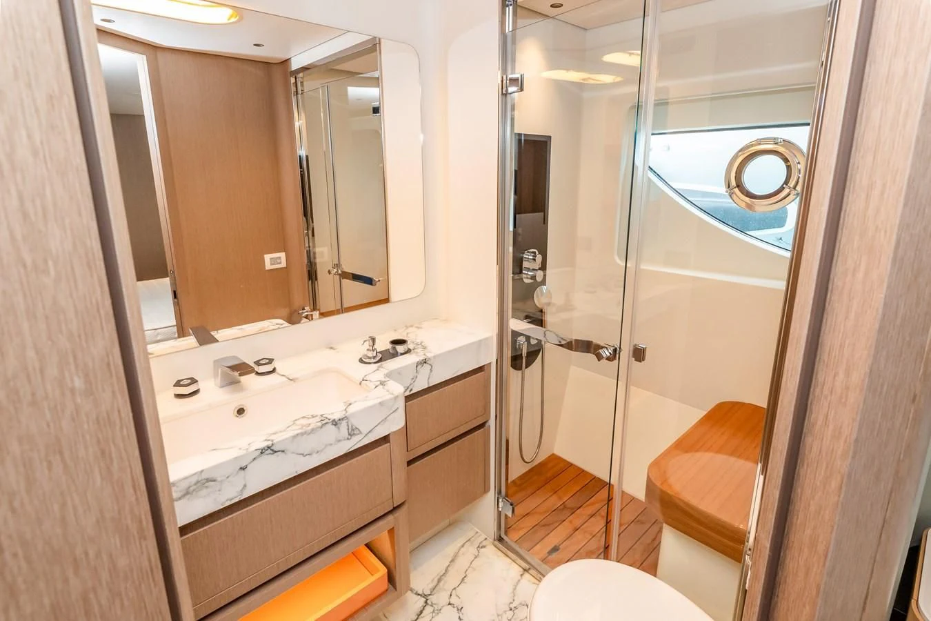 a bathroom with a large mirror aboard AZIMUT GRANDE 26/25 Yacht for Sale