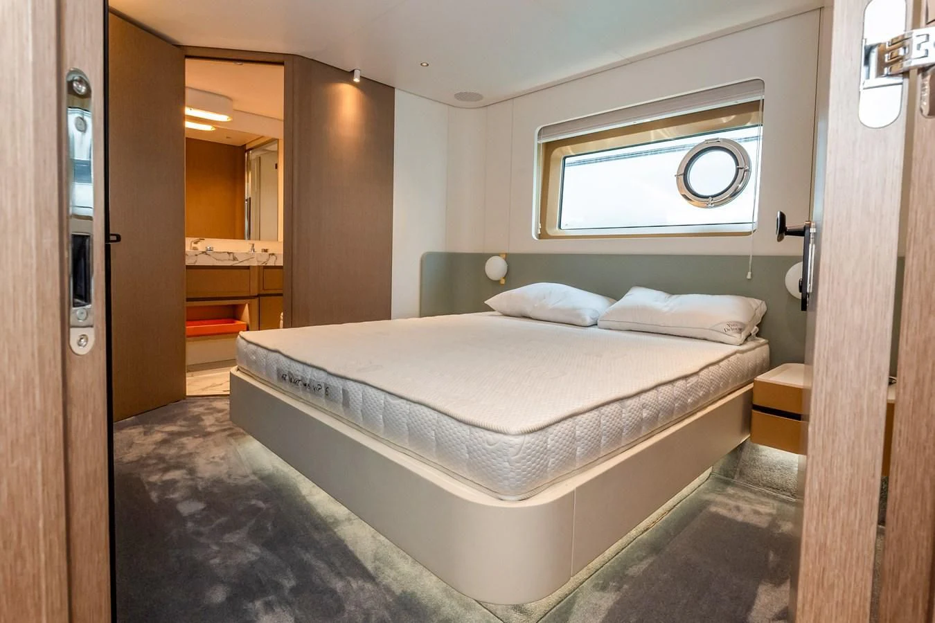 a bed in a room aboard AZIMUT GRANDE 26/25 Yacht for Sale