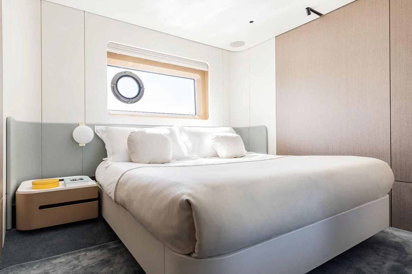 a bed with white sheets aboard AZIMUT GRANDE 26/25 Yacht for Sale