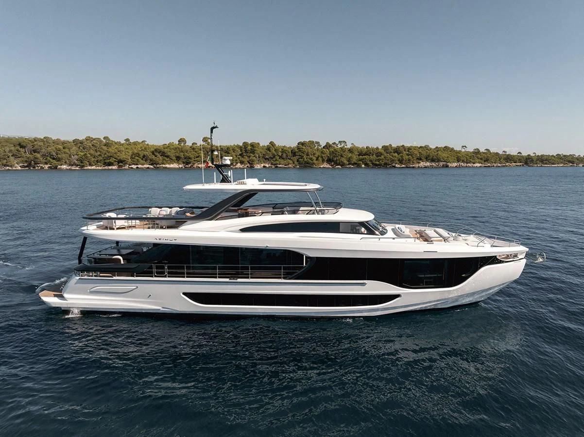 a white yacht on the water aboard AZIMUT GRANDE 26/25 Yacht for Sale