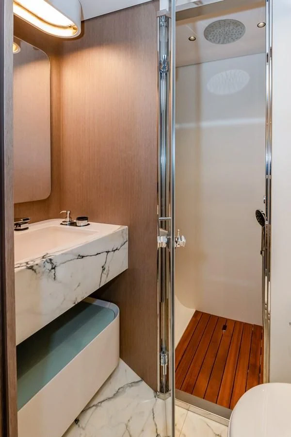 a bathroom with a sink and a shower aboard AZIMUT GRANDE 26/25 Yacht for Sale