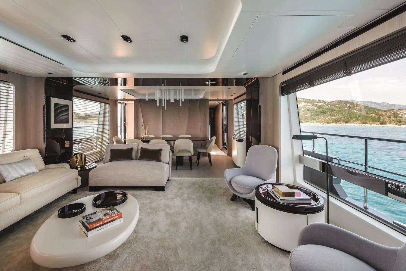 a living room with a large balcony aboard AZIMUT GRANDE 26/25 Yacht for Sale