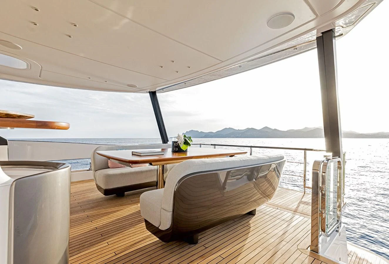 a table on a boat aboard AZIMUT GRANDE 26/25 Yacht for Sale