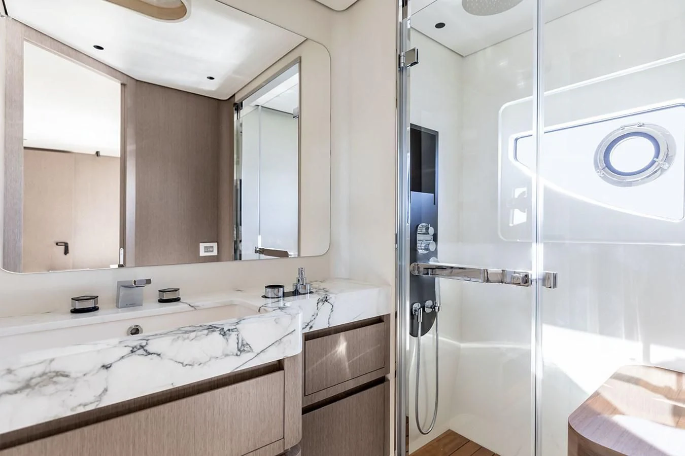 a bathroom with a glass shower aboard AZIMUT GRANDE 26/25 Yacht for Sale
