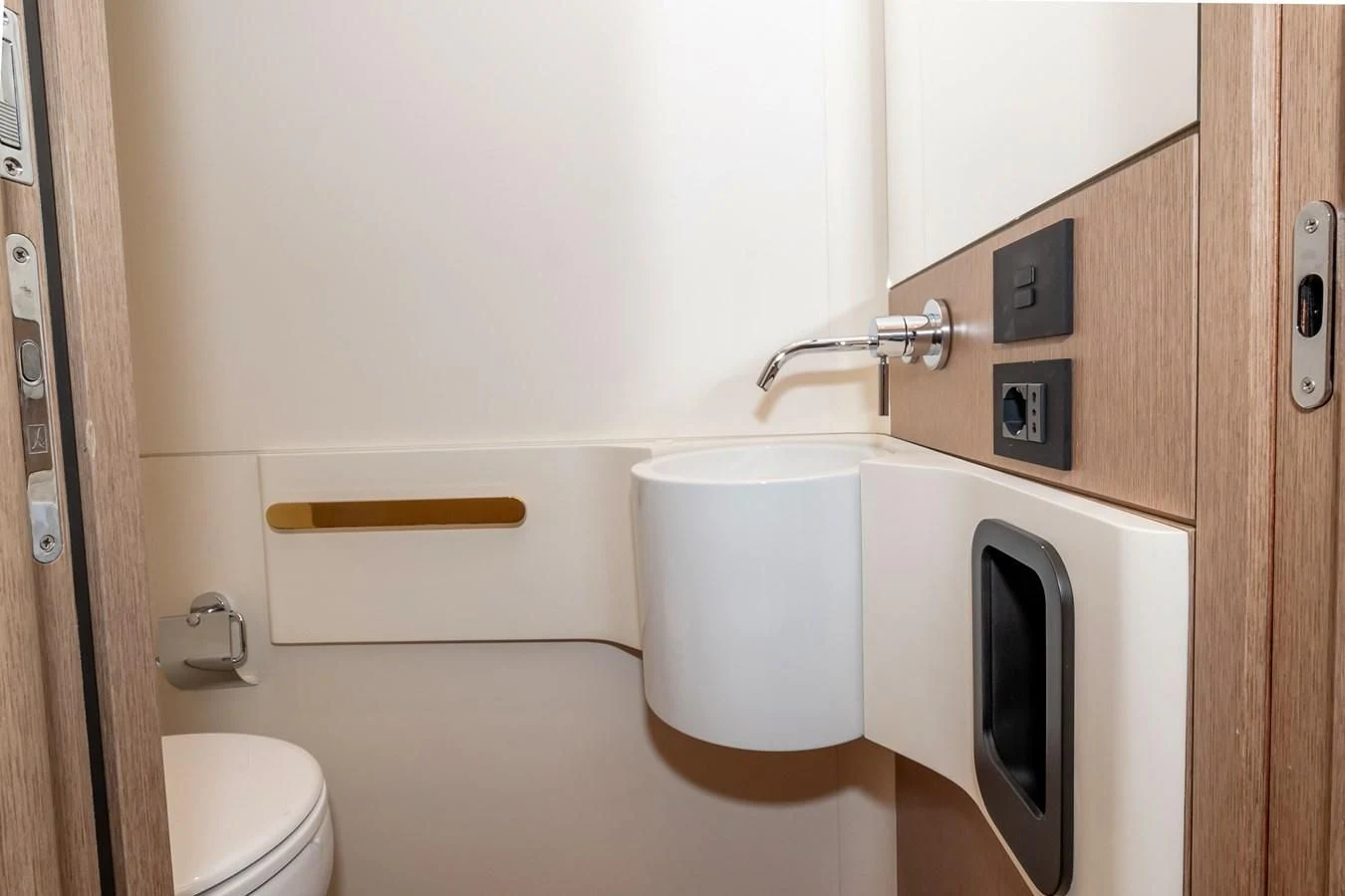 a small bathroom with a toilet aboard AZIMUT GRANDE 26/25 Yacht for Sale